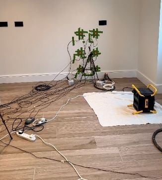 Test equipment and cabling set up in a room of the Partner House during the Salford testing