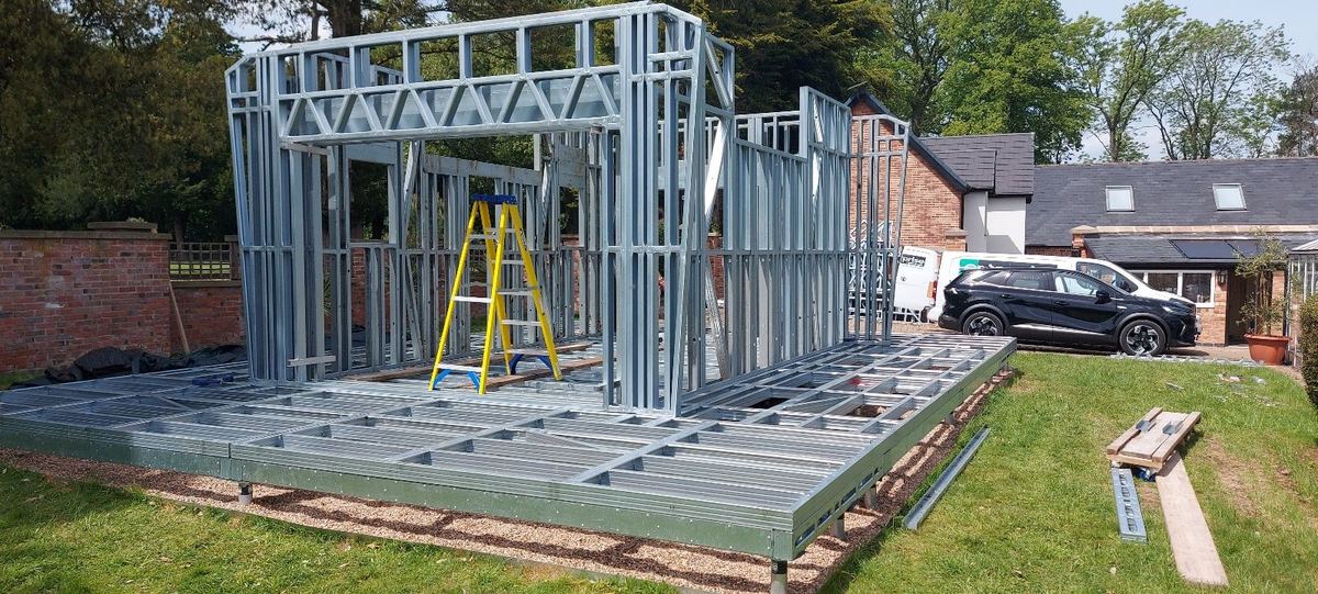 Wall frames going up on the base