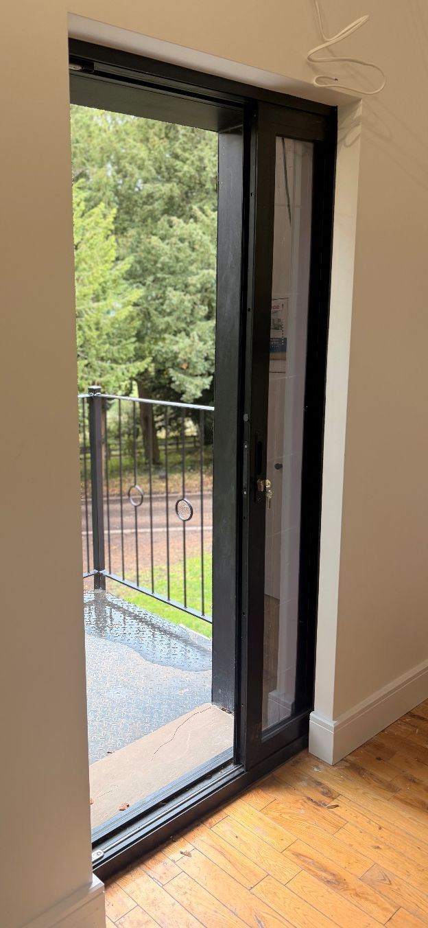 A glazed door opening showing the detailing around the frame